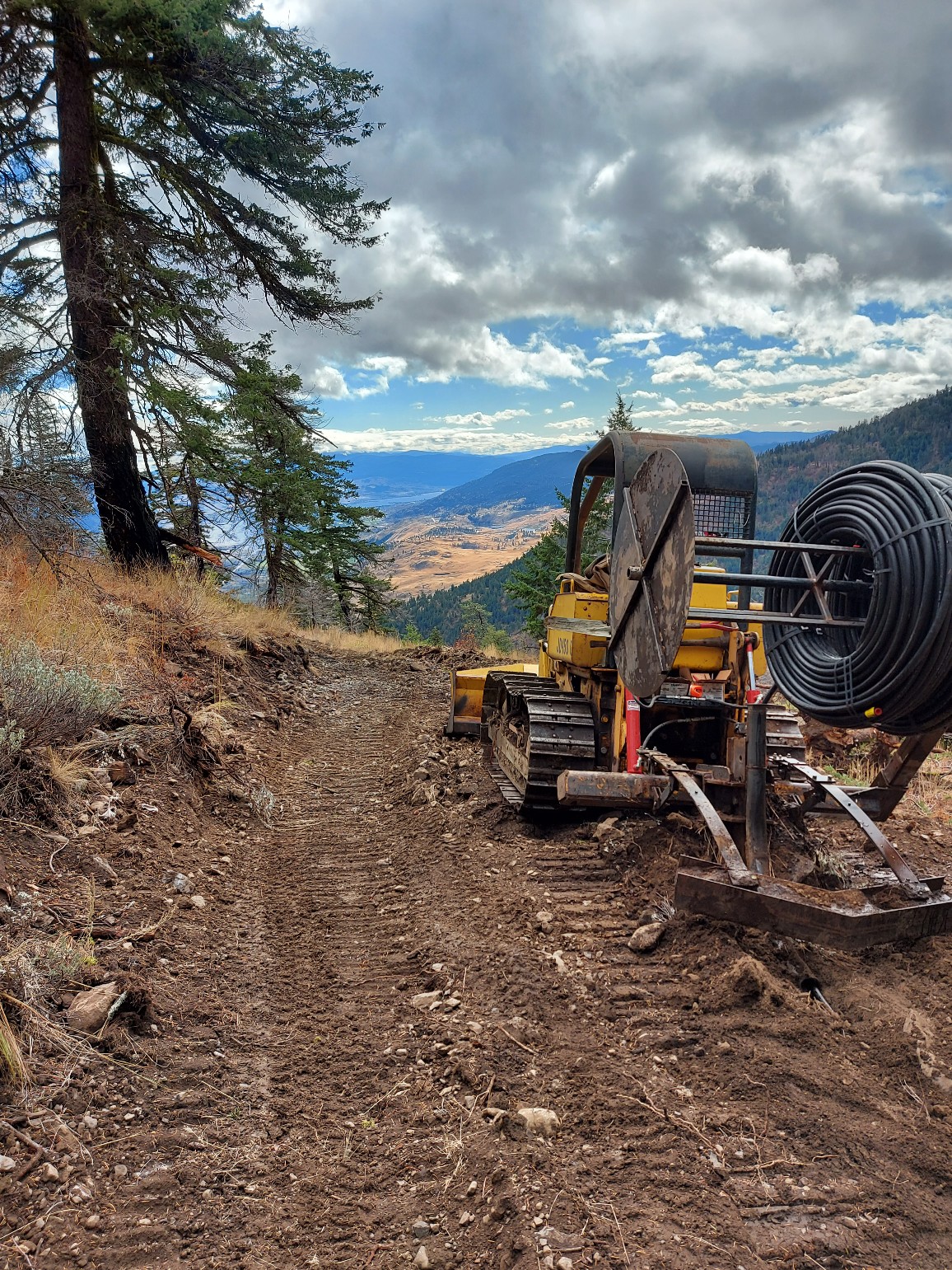 waterline install Wellman Fence & Land Okanagan | Land Clearing